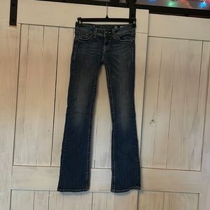 Size 26 Miss Me girls boot cut jeans.